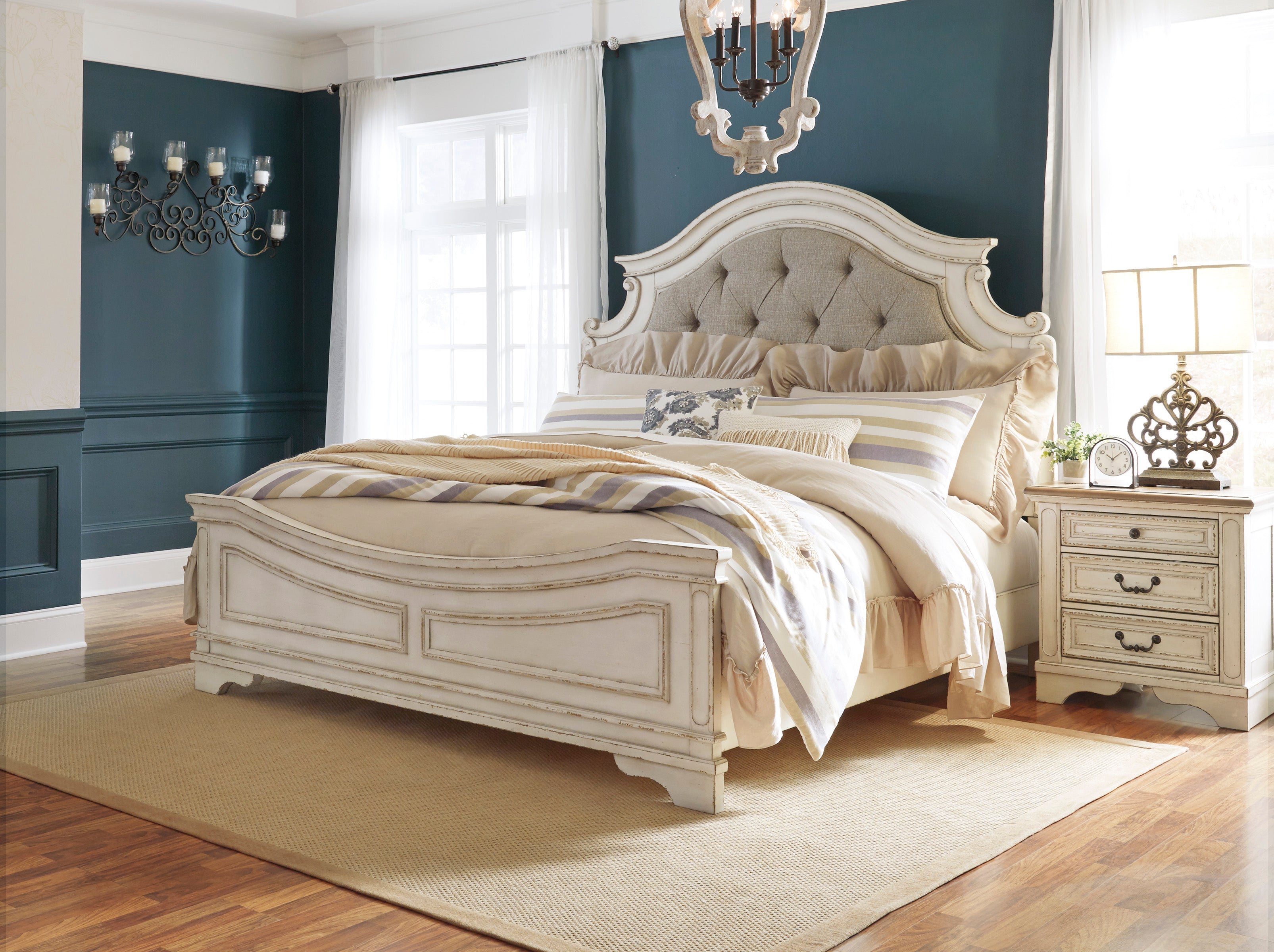 Realyn Queen Upholstered Panel Bed